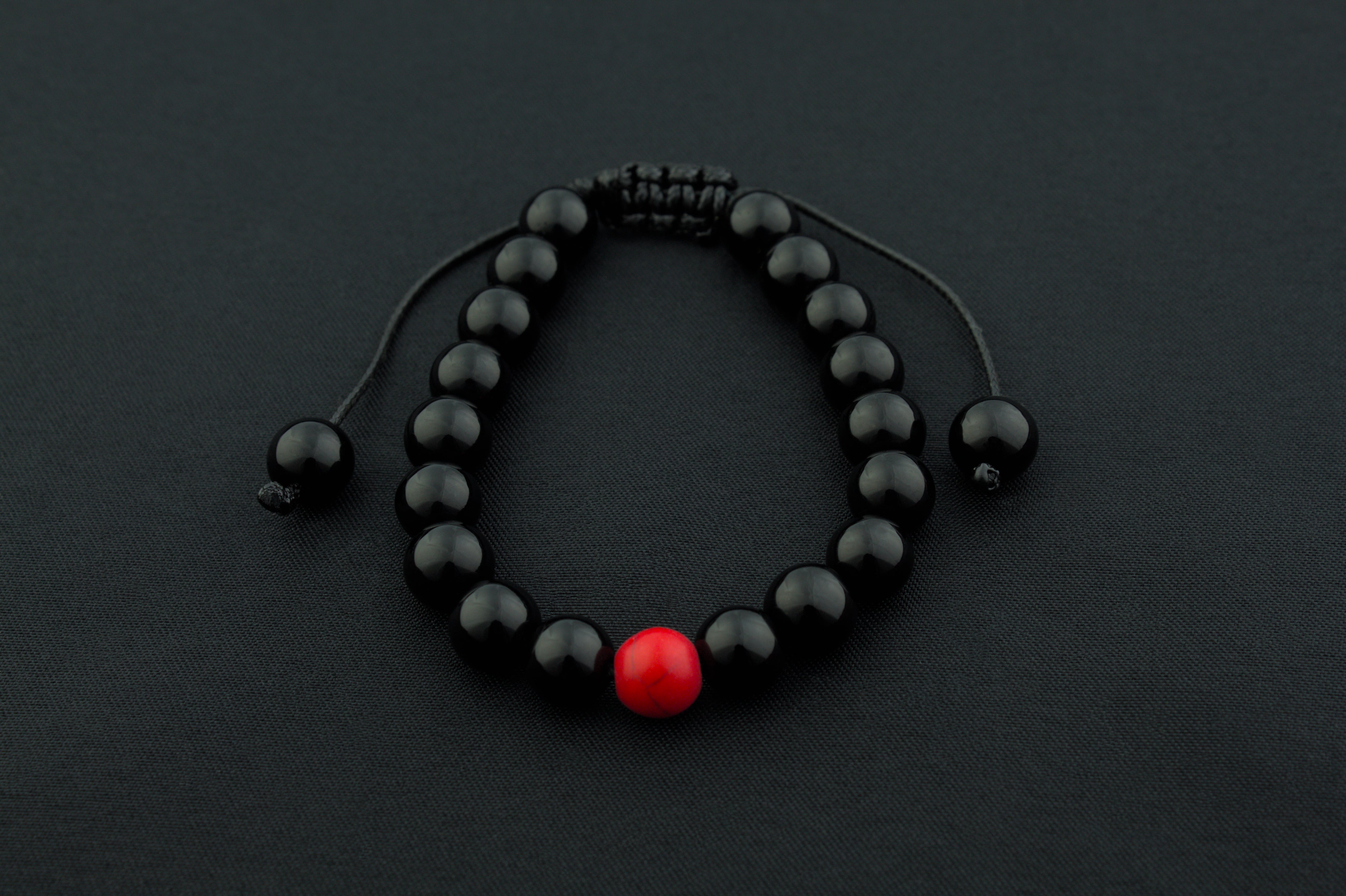 Pulseras de la distancia color negro y rojo