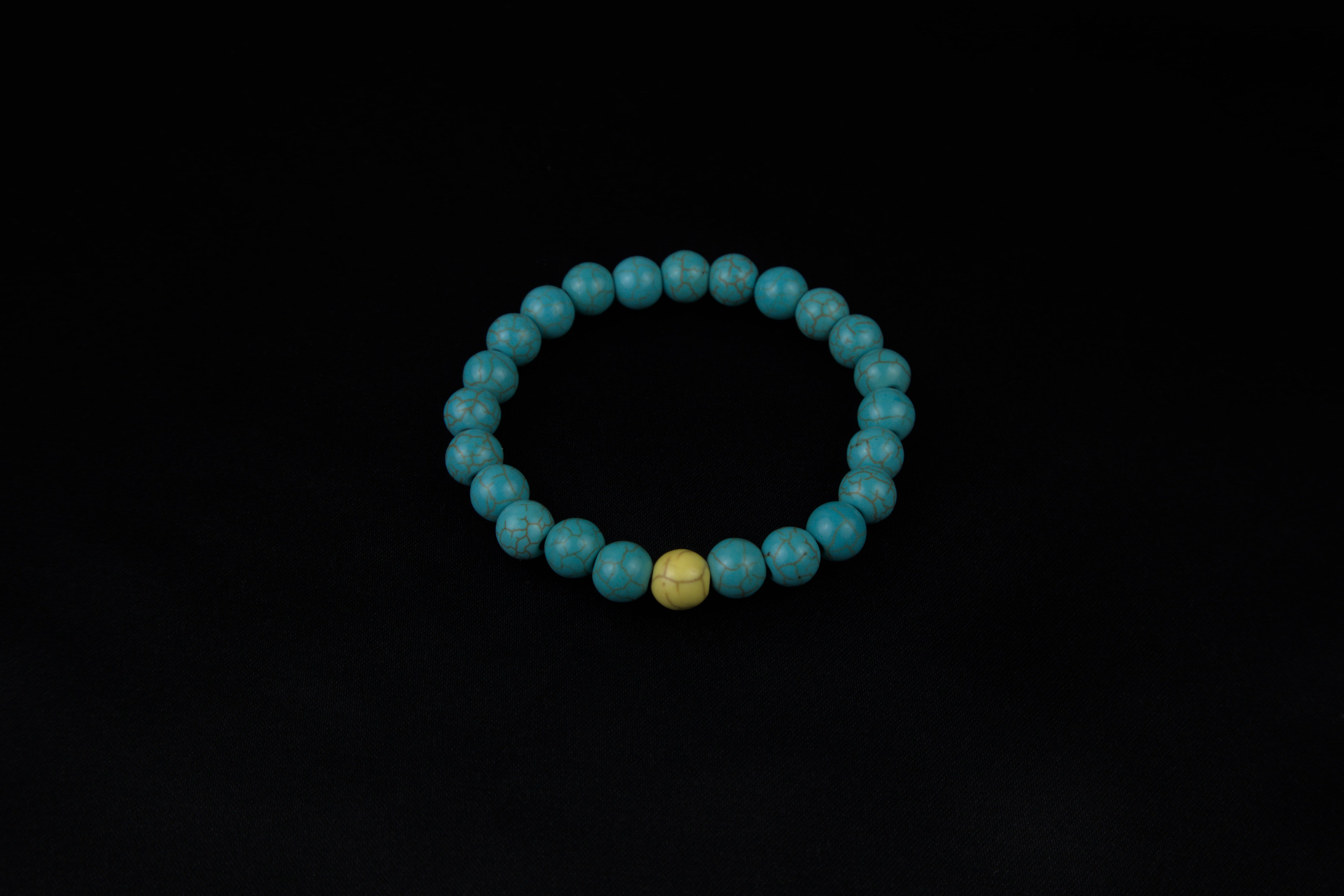 Pulseras de la distancia azul con amarillo