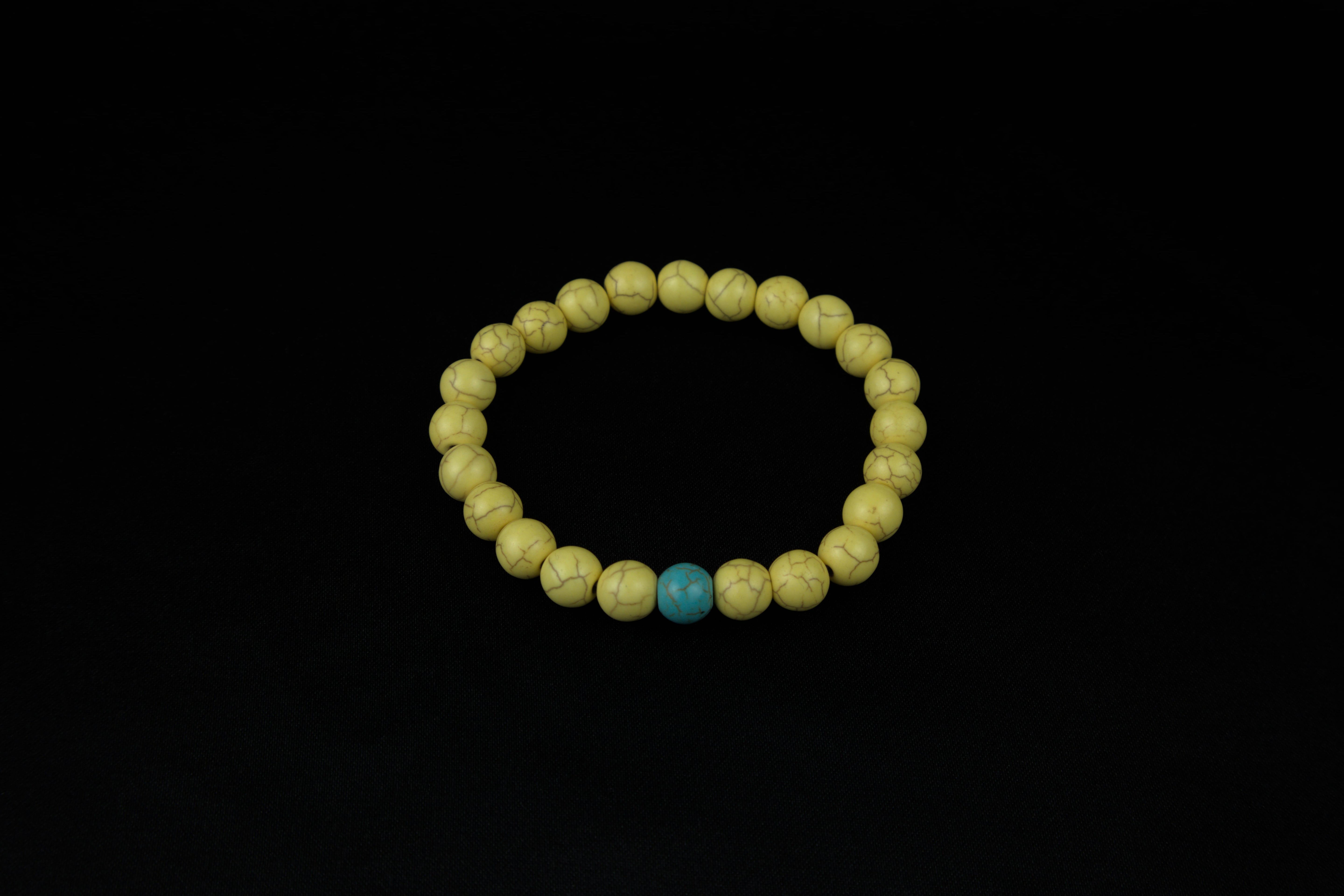 Pulseras de la distancia azul con amarillo