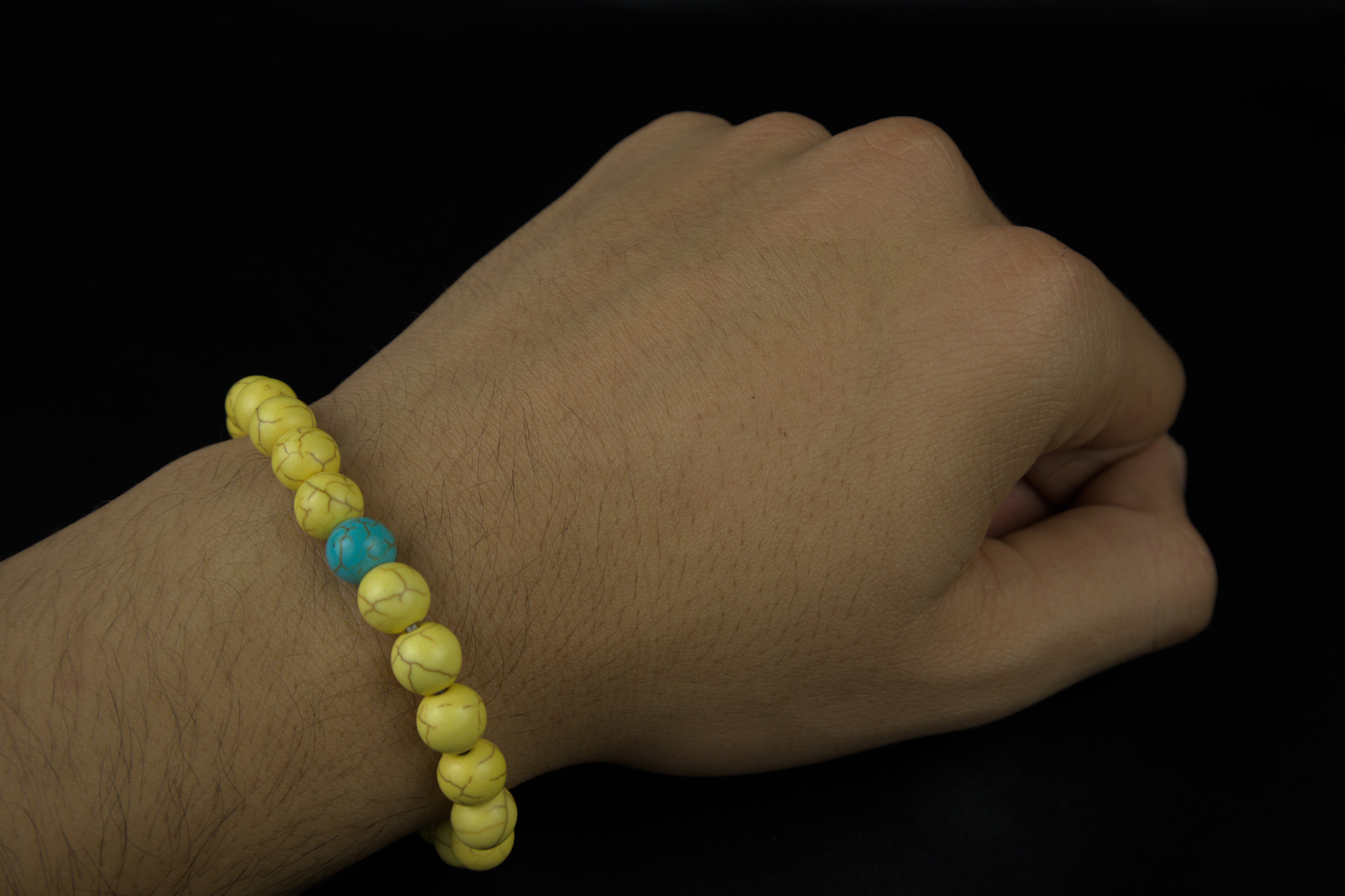 Pulseras de la distancia azul con amarillo