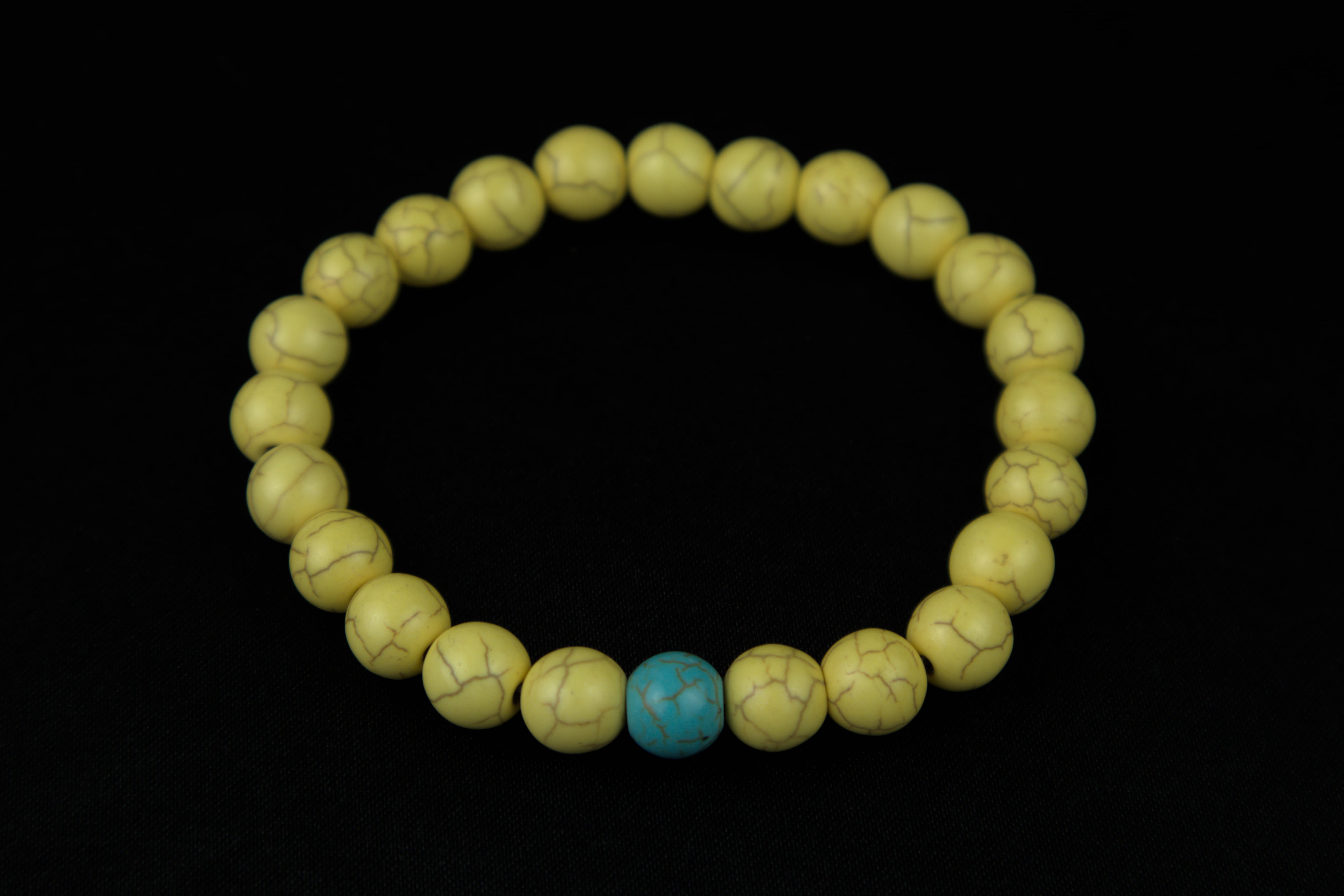 Pulseras de la distancia azul con amarillo