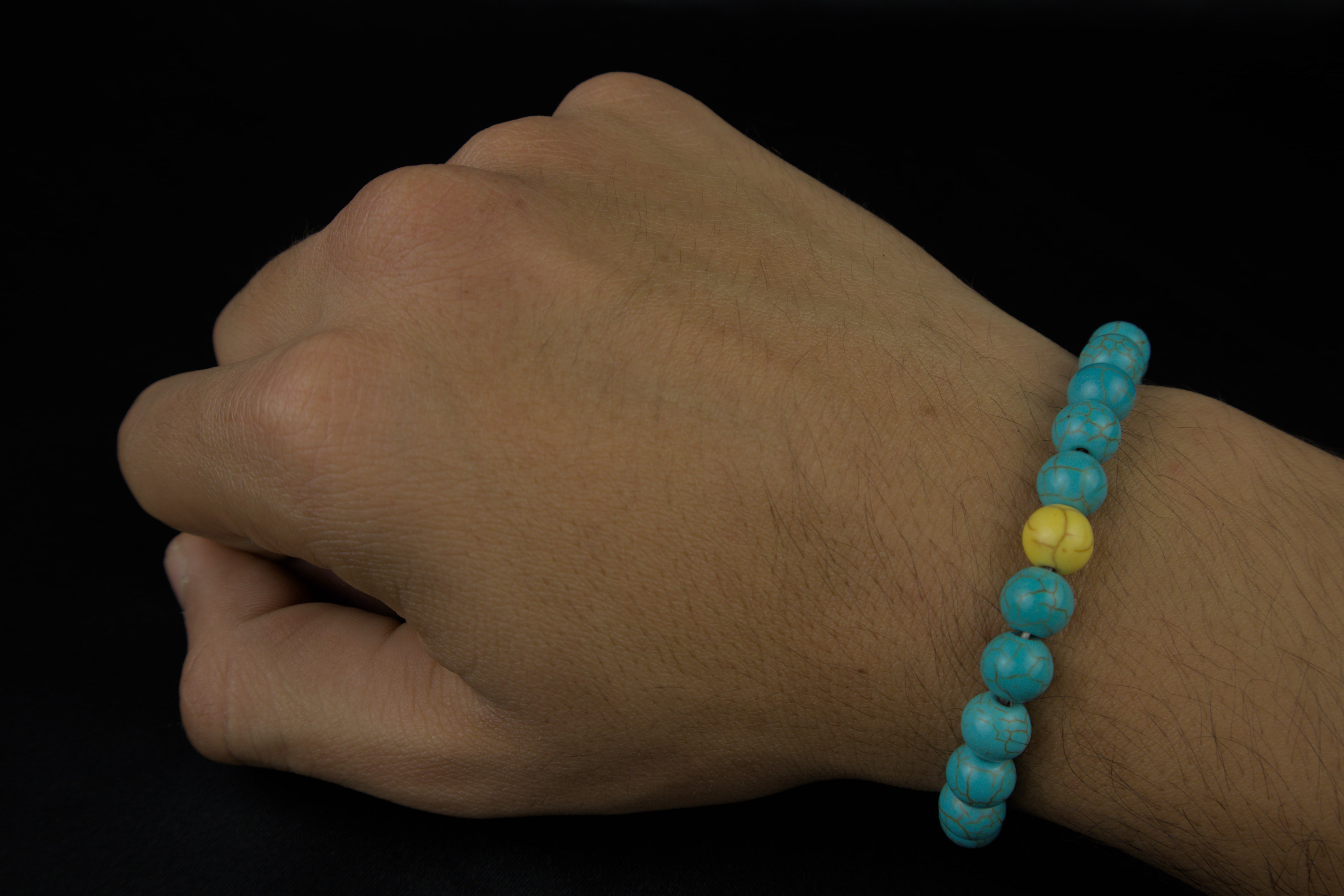 Pulseras de la distancia azul con amarillo